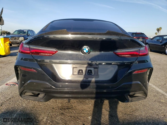2020 BMW 8 Series 840i with VIN WBAGV4C06LCE28998, listed as a Copart auction lot 48566634 with 54,946 mi miles and Salvage Title. Bid and sale history available at carsss.com. Image 6.