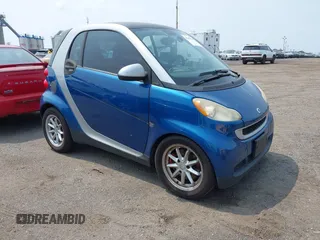 2008 Smart fortwo Pure z VIN WMEEJ31X88K195623, wystawiony jako IAAI lot #42470738 z przebiegiem 123 494 mil mil oraz . Historia ofert i sprzedaży dostępna na DreamBid. Obrazek 1.