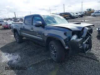 2021 Toyota Tacoma SR5 with VIN 3TMDZ5BN6MM105948, listed as a IAAI auction lot 41812048 with 53,041 mi miles and . Bid and sale history available at DreamBid. Image 1.