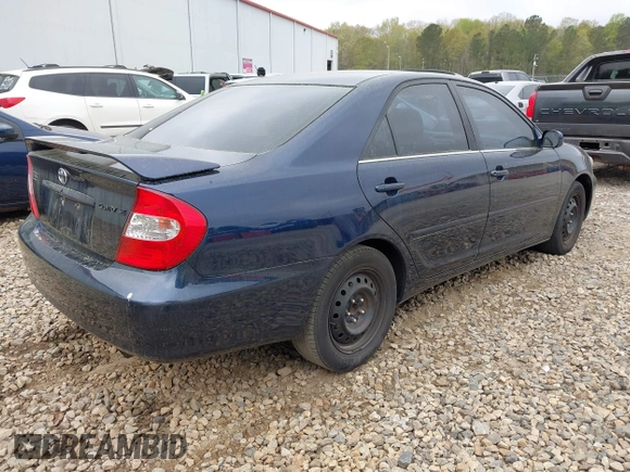 2003 Toyota Camry LE with VIN 4T1BE32K13U241259, listed as a IAAI auction lot 41907480 with 281,229 mi miles and . Bid and sale history available at DreamBid. Image 4.