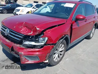 2018 Volkswagen Tiguan SEL z VIN 3VV3B7AX1JM214734, wystawiony jako IAAI lot #42473627 z przebiegiem 79 152 mil mil oraz . Historia ofert i sprzedaży dostępna na DreamBid. Obrazek 6.
