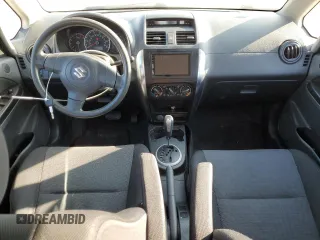 2009 Suzuki SX4 Man FWD with VIN JS2YC412696201399, listed as a Copart auction lot 87543165 with 150,739 mi miles and Salvage Title. Bid and sale history available at carsss.com. Image 8.