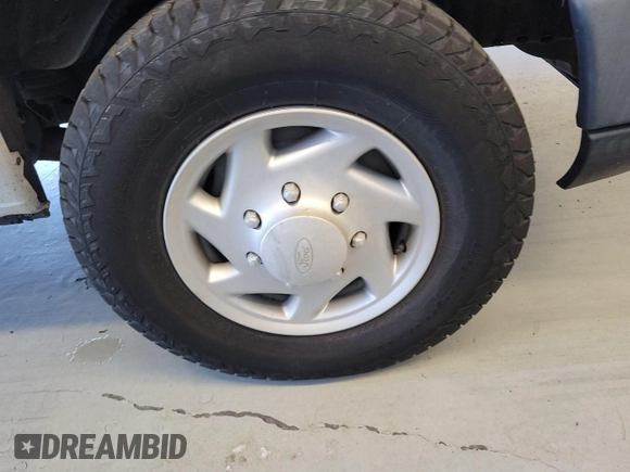 2012 Ford Econoline Cargo Commercial with VIN 1FTNE2EL9CDB21032, listed as a IAAI auction lot 42787135 with 106,406 mi miles and . Bid and sale history available at DreamBid. Image 24.