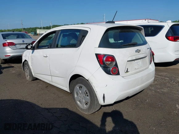 2015 Chevrolet Sonic LS with VIN 1G1JA6SG8F4131976, listed as a IAAI auction lot 42552157 with 99,575 mi miles and . Bid and sale history available at DreamBid. Image 3.