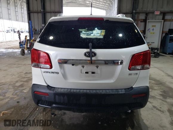 2012 Kia Sorento EX z VIN 5XYKU4A25CG271932, wystawiony jako Copart lot #51371565 z przebiegiem 208 398 mil mil oraz Nie do naprawy • Non repairable. Historia ofert i sprzedaży dostępna na DreamBid. Obrazek 6.