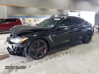 2021 Genesis G70 3.3T with VIN KMTG34LE7MU076383, listed as a Copart auction lot 71798544 with 35,450 mi miles and Salvage Title. Bid and sale history available at carsss.com. Image 1.