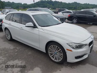 2015 BMW 3 Series 328i xDrive with VIN WBA3G7C51FK296763, listed as a IAAI auction lot 42403453 with 113,105 mi miles and . Bid and sale history available at DreamBid. Image 1.