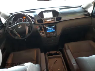 2014 Honda Odyssey Touring with VIN 5FNRL5H99EB111525, listed as a Copart auction lot 61986005 with 137,905 mi miles and Salvage title. Bid and sale history available at DreamBid. Image 8.