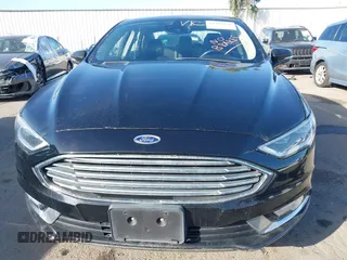 2017 Ford Fusion Energi SE with VIN 3FA6P0PU0HR129792, listed as a IAAI auction lot 41104376 with 86,659 mi miles. Bid and sale history available at carsss.com. Image 6.