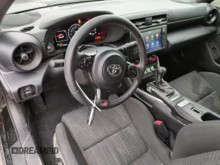 2023 Toyota GR86 with VIN JF1ZNBC10P8757572, listed as a Copart auction lot 43291525 with 12,898 mi miles and Salvage Title. Bid and sale history available at carsss.com. Image 8.