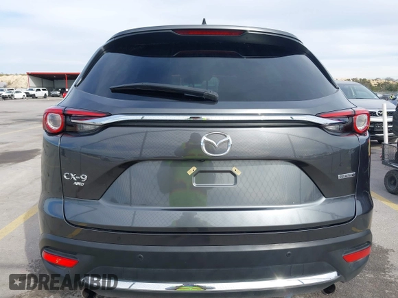 2023 Mazda CX-9 Grand Touring z VIN JM3TCBDY0P0631395, wystawiony jako IAAI lot #41449555 z przebiegiem 17 721 mil mil oraz . Historia ofert i sprzedaży dostępna na DreamBid. Obrazek 16.