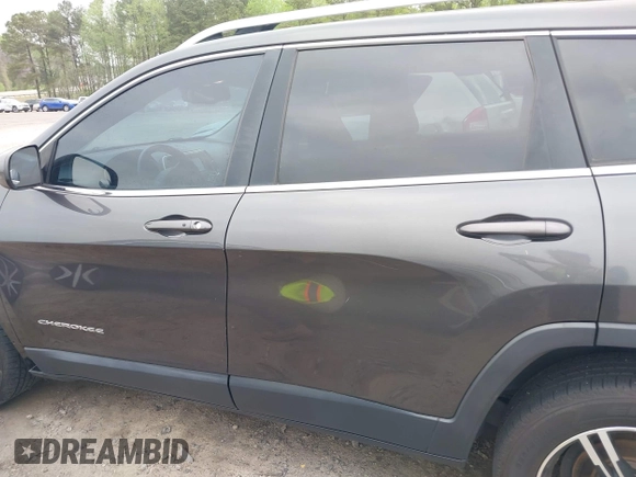 2015 Jeep Cherokee Latitude with VIN 1C4PJLCB0FW601862, listed as a IAAI auction lot 41931048 with 100,705 mi miles and . Bid and sale history available at DreamBid. Image 15.