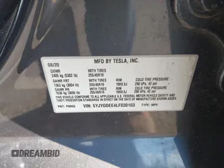 2020 Tesla Model Y Long Range with VIN 5YJYGDEE4LF030103, listed as a IAAI auction lot 41328929 with 64,896 mi miles and . Bid and sale history available at DreamBid. Image 9.