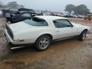 1979 Pontiac Firebird z VIN 2U87K9N120105, wystawiony jako Copart lot #80135024 z przebiegiem 87 739 mil mil oraz Tytuł czysty. Historia ofert i sprzedaży dostępna na DreamBid. Obrazek 3.