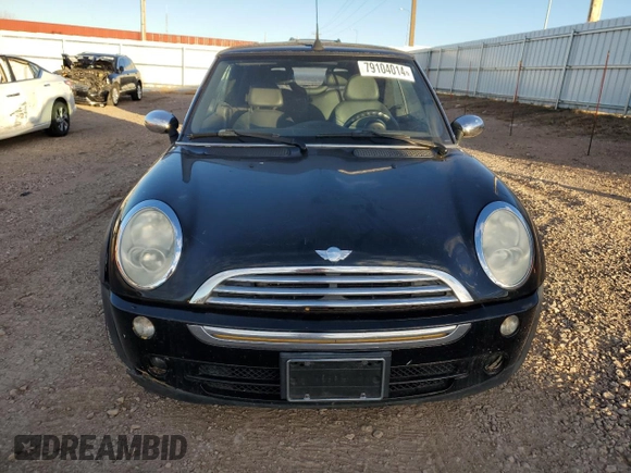 2007 MINI Convertible with VIN WMWRF33597TG16707, listed as a Copart auction lot 79104014 with 113,380 mi miles and Salvage Title. Bid and sale history available at DreamBid. Image 5.