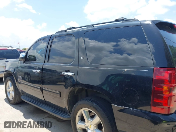 2011 Chevrolet Tahoe LT with VIN 1GNSCBE01BR389984, listed as a IAAI auction lot 42673033 with 289,294 mi miles and . Bid and sale history available at DreamBid. Image 14.