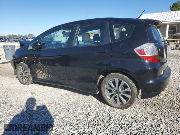 2013 Honda Fit Sport with VIN JHMGE8H54DC033780, listed as a Copart auction lot 79557204 with 67,384 mi miles and Clean Title. Bid and sale history available at carsss.com. Image 2.