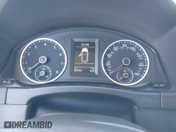2014 Volkswagen Tiguan S z VIN WVGBV3AX4EW581302, wystawiony jako IAAI lot #41033175 z przebiegiem 69 791 mil mil oraz . Historia ofert i sprzedaży dostępna na DreamBid. Obrazek 7.