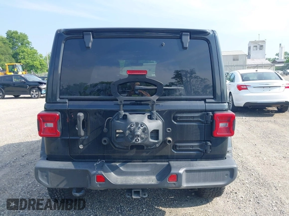 2020 Jeep Wrangler Unlimited Sahara High Altitude with VIN 1C4HJXEGXLW182581, listed as a IAAI auction lot 42612084 with 52,656 mi miles and . Bid and sale history available at DreamBid. Image 17.