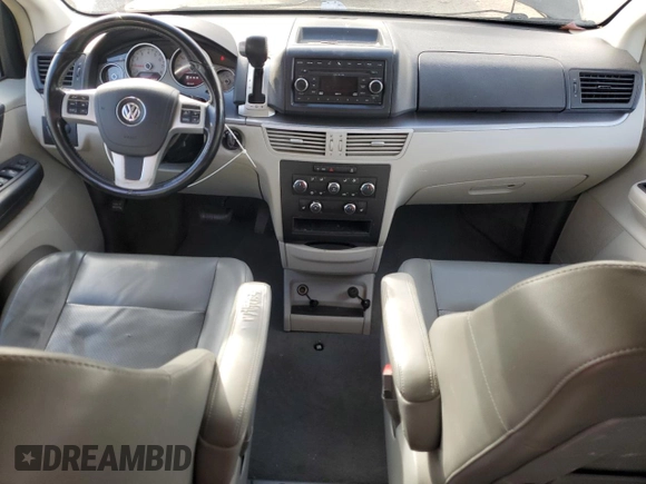 2011 Volkswagen Routan SE with VIN 2V4RW3DGXBR642528, listed as a Copart auction lot 45082055 with 167,067 mi miles and Salvage title. Bid and sale history available at DreamBid. Image 8.