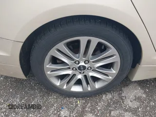 2014 Lincoln MKZ Hybrid with VIN 3LN6L2LU8ER813195, listed as a IAAI auction lot 42578644 with 153,893 mi miles and . Bid and sale history available at DreamBid. Image 12.