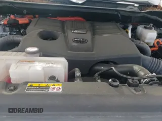 2023 Toyota Tundra TRD Pro Hybrid with VIN 5TFPC5DB9PX027956, listed as a Copart auction lot 64729205 with 50,417 mi miles and Salvage title. Bid and sale history available at DreamBid. Image 13.
