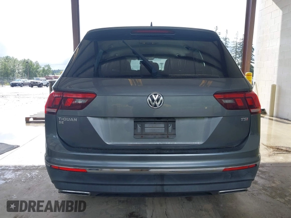 2018 Volkswagen Tiguan SEL with VIN 3VV3B7AX6JM054849, listed as a IAAI auction lot 42303112 with 87,574 mi miles and . Bid and sale history available at DreamBid. Image 16.