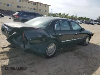 1998 Lincoln Continental with VIN 1LNFM97V8WY742639, listed as a Copart auction lot 82138303 with 268,814 mi miles and Salvage Title. Bid and sale history available at carsss.com. Image 3.