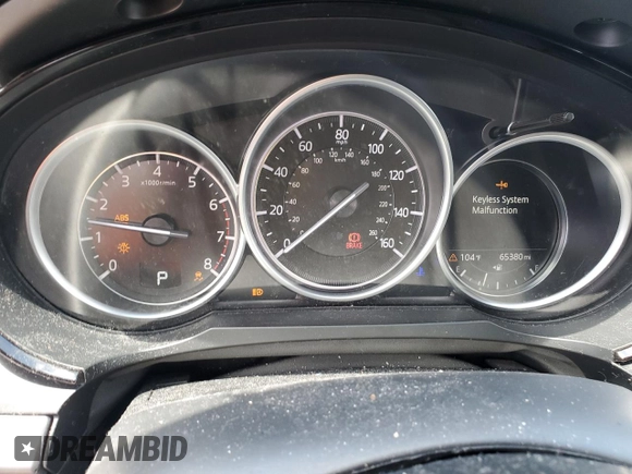 2020 Mazda CX-9 Touring с VIN JM3TCACY2L0414453, выставлен на аукционе Copart как лот 63451845 с пробегом 65 380 миль миль и Списание • Salvage title. История ставок и продаж доступна на DreamBid. Изображение 9.