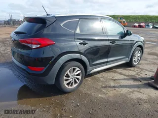 2017 Hyundai Tucson SE Plus with VIN KM8J33A41HU327540, listed as a IAAI auction lot 41820850 with 129,227 mi miles. Bid and sale history available at carsss.com. Image 4.