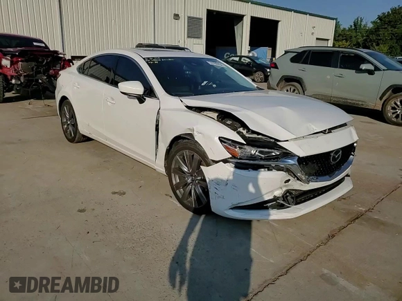 2019 Mazda 6 Grand Touring with VIN JM1GL1TY4K1507123, listed as a Copart auction lot 74100054 with 63,809 mi miles and Salvage Title. Bid and sale history available at carsss.com. Image 11.