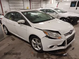 2014 Ford Focus SE with VIN 1FADP3F21EL200534, listed as a IAAI auction lot 41942026 with 61,414 mi miles. Bid and sale history available at carsss.com. Image 1.