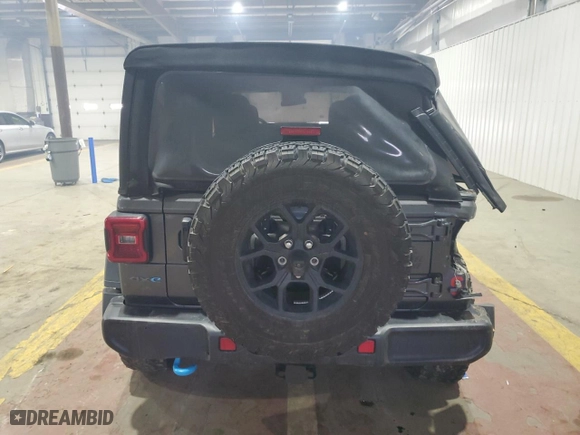 2024 Jeep Wrangler 4xe Willys with VIN 1C4RJXN62RW162894, listed as a Copart auction lot 44774585 with 20,711 mi miles and Salvage Title. Bid and sale history available at carsss.com. Image 6.