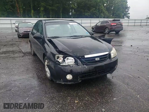 2005 Kia Spectra LX with VIN KNAFE121055134568, listed as a Copart auction lot 71541244 with 146,751 mi miles and Salvage Title. Bid and sale history available at carsss.com. Image 11.