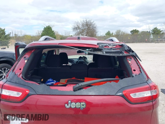 2014 Jeep Cherokee Latitude with VIN 1C4PJLCS3EW143362, listed as a IAAI auction lot 42150037 with 86,012 mi miles. Bid and sale history available at carsss.com. Image 6.