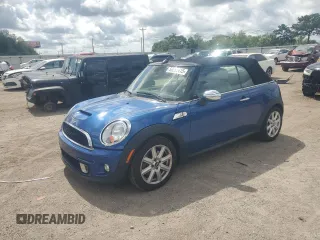 2015 MINI Convertible S with VIN WMWZP3C59F2A91231, listed as a Copart auction lot 59296415 with 31,642 mi miles and Salvage title. Bid and sale history available at DreamBid. Image 1.