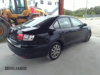 2011 Volkswagen Jetta Sedan SE with VIN 3VWDX7AJ7BM390282, listed as a IAAI auction lot 41673478 with 196,094 mi miles. Bid and sale history available at carsss.com. Image 4.