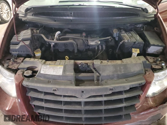 2007 Chrysler Town & Country Touring with VIN 2A4GP54LX7R221370, listed as a Copart auction lot 42526585 with 217,368 mi miles and Salvage Title. Bid and sale history available at DreamBid. Image 12.