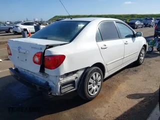 2004 Toyota Corolla CE with VIN JTDBR32E540051928, listed as a IAAI auction lot 41958483 with 299,999 mi miles. Bid and sale history available at carsss.com. Image 4.