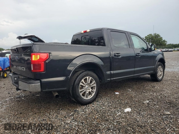 2020 Ford F-150 XL with VIN 1FTEW1C50LKD77986, listed as a Copart auction lot 61247745 with 140,855 mi miles and Salvage title. Bid and sale history available at DreamBid. Image 3.