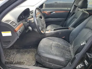 2005 Mercedes-Benz E 500 z VIN WDBUF70J55A666031, wystawiony jako Copart lot #70750964 z przebiegiem Nie podano mil oraz Nie do naprawy • Non repairable. Historia ofert i sprzedaży dostępna na DreamBid. Obrazek 7.