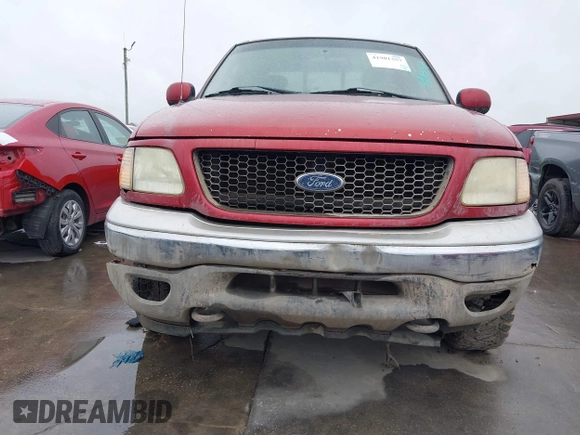 2003 Ford F-150 XL with VIN 2FTPX18LX3CA89961, listed as a IAAI auction lot 41901357 with 199,708 mi miles. Bid and sale history available at carsss.com. Image 16.
