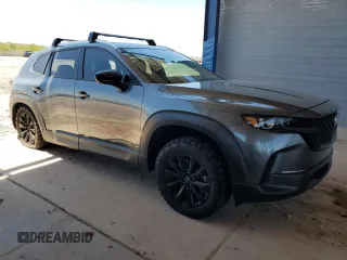 2025 Mazda CX-50 S Premium z VIN 7MMVABDM6SN307397, wystawiony jako Copart lot #57020085 z przebiegiem 13 504 mil mil oraz Szkoda całkowita • Salvage title. Historia ofert i sprzedaży dostępna na DreamBid. Obrazek 4.