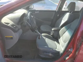 2015 Hyundai Accent Sport with VIN KMHCU5AE5FU233118, listed as a Copart auction lot 76130524 with 150,019 mi miles and Salvage Title. Bid and sale history available at carsss.com. Image 7.