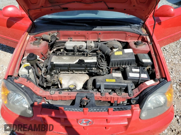 2005 Hyundai Accent GLS with VIN KMHCG45C15U592443, listed as a Copart auction lot 52291025 with 142,263 mi miles and Salvage Title. Bid and sale history available at carsss.com. Image 12.