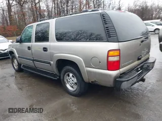 2003 Chevrolet Suburban LT z VIN 3GNFK16Z23G208162, wystawiony jako IAAI lot #41508649 z przebiegiem 329 695 mil mil oraz . Historia ofert i sprzedaży dostępna na DreamBid. Obrazek 3.