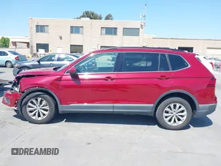 2018 Volkswagen Tiguan SEL z VIN 3VV3B7AX1JM214734, wystawiony jako IAAI lot #42473627 z przebiegiem 79 152 mil mil oraz . Historia ofert i sprzedaży dostępna na DreamBid. Obrazek 14.