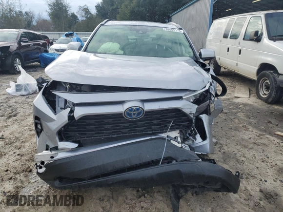2023 Toyota RAV4 Hybrid XLE Premium z VIN JTMB6RFV8PD115723, wystawiony jako Copart lot #88005175 z przebiegiem 18 363 mil mil oraz Szkoda całkowita • Salvage title. Historia ofert i sprzedaży dostępna na DreamBid. Obrazek 5.
