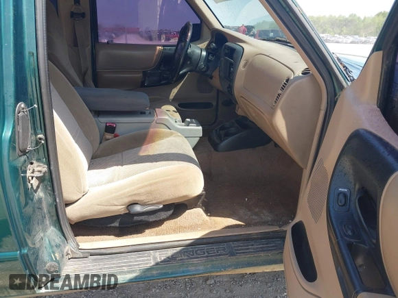 1999 Ford Ranger XLT with VIN 1FTZR15X7XPA71738, listed as a IAAI auction lot 42071163 with 225,035 mi miles and . Bid and sale history available at DreamBid. Image 5.