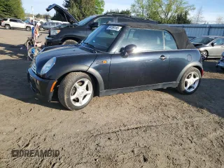 2006 MINI Convertible with VIN WMWRF33576TG15523, listed as a Copart auction lot 54199155 with 60,512 mi miles and Clean Title. Bid and sale history available at DreamBid. Image 1.